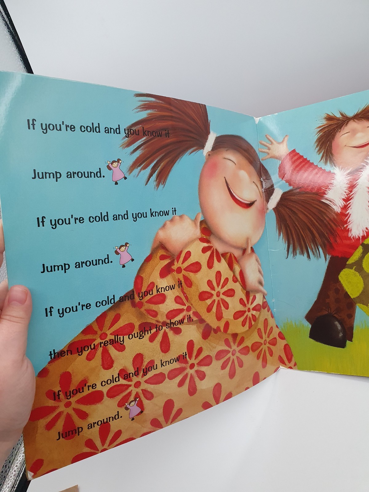 IF YOU&rsquo;RE HAPPY AND YOU KNOW IT KIDS BOOK ILLUSTRATED BY WENDY STRAW 2009