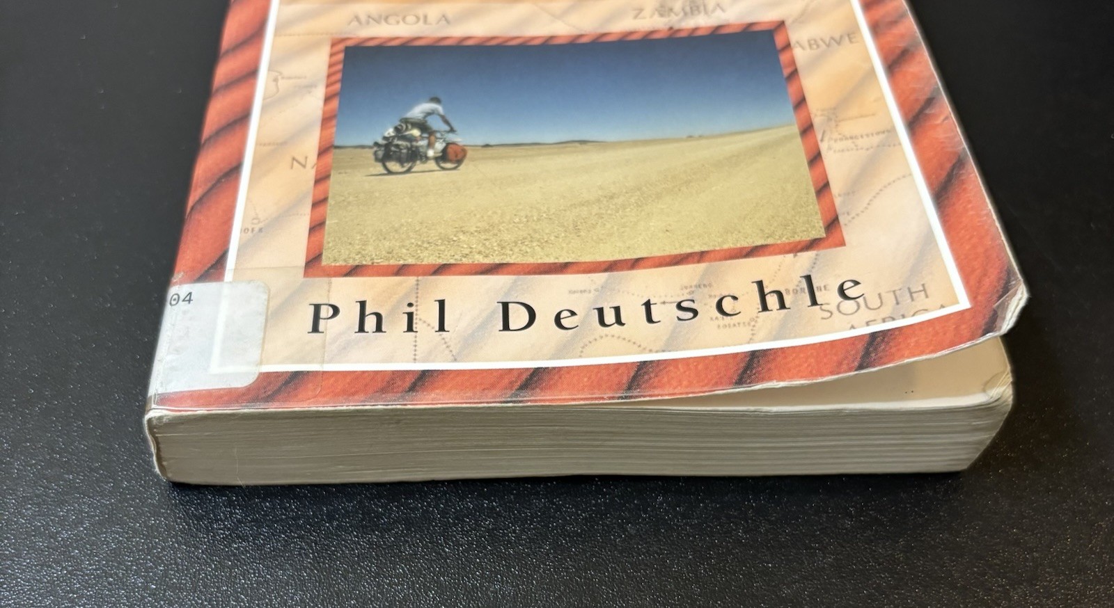 Vintage 2000 Across African Sand by Phil Deutschle (1st Ed PB Ex‑Library)