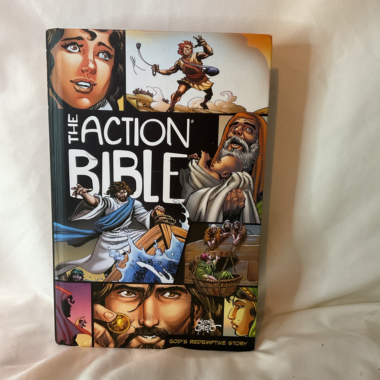 The Action Bible: God&rsquo;s Redemptive Story by Sergio Cariello HC 2020 David C Cook
