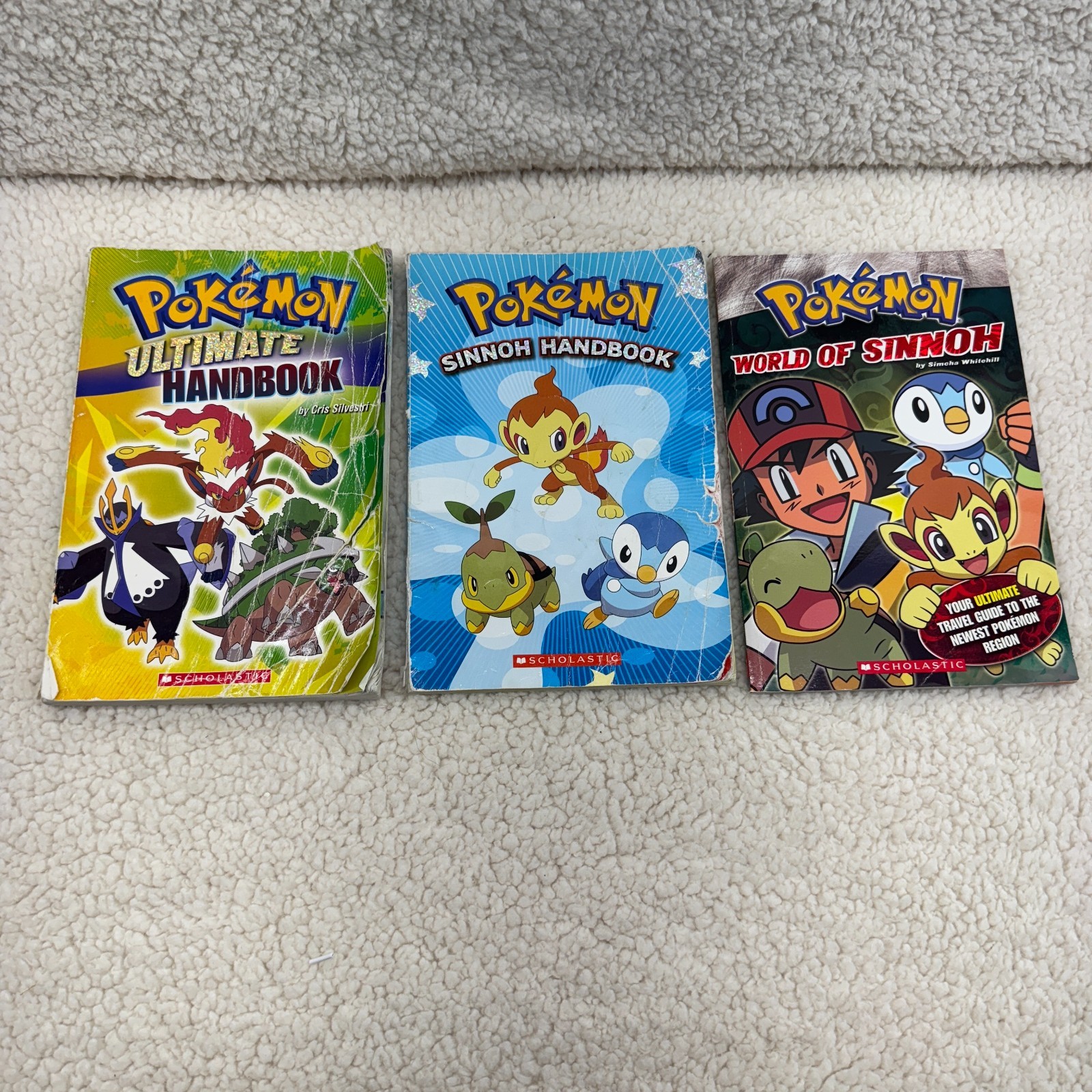 Lot of 8 Pokémon Books + VHS – Drawing, Sinnoh, Black & White Strategy Guide