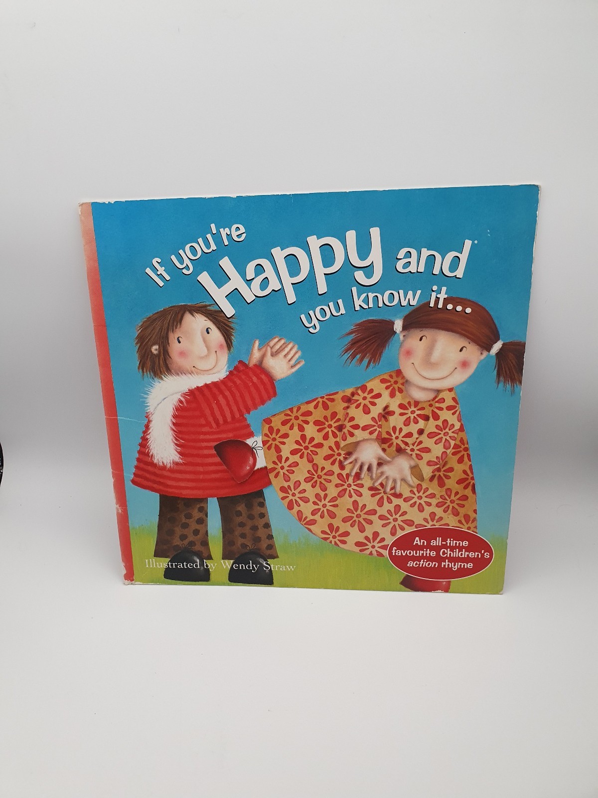 IF YOU&rsquo;RE HAPPY AND YOU KNOW IT KIDS BOOK ILLUSTRATED BY WENDY STRAW 2009