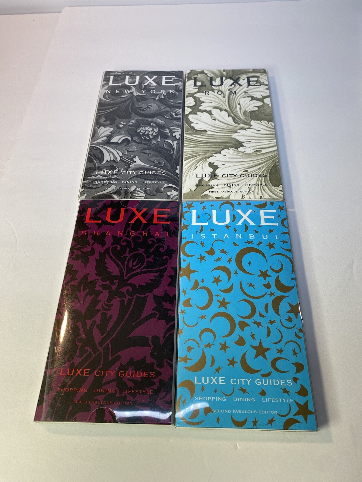 Luxe City Guides in Box, set of 12 in black flocked on white bkgd Travel Gift