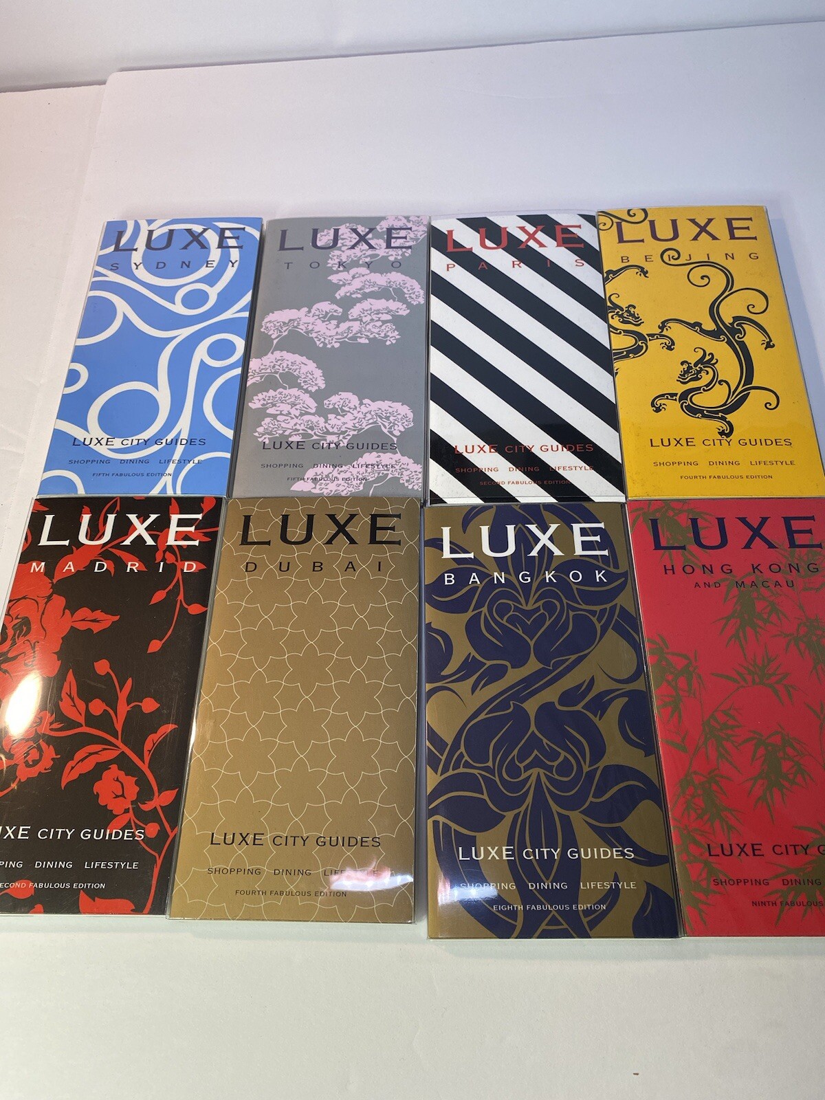 Luxe City Guides in Box, set of 12 in black flocked on white bkgd Travel Gift