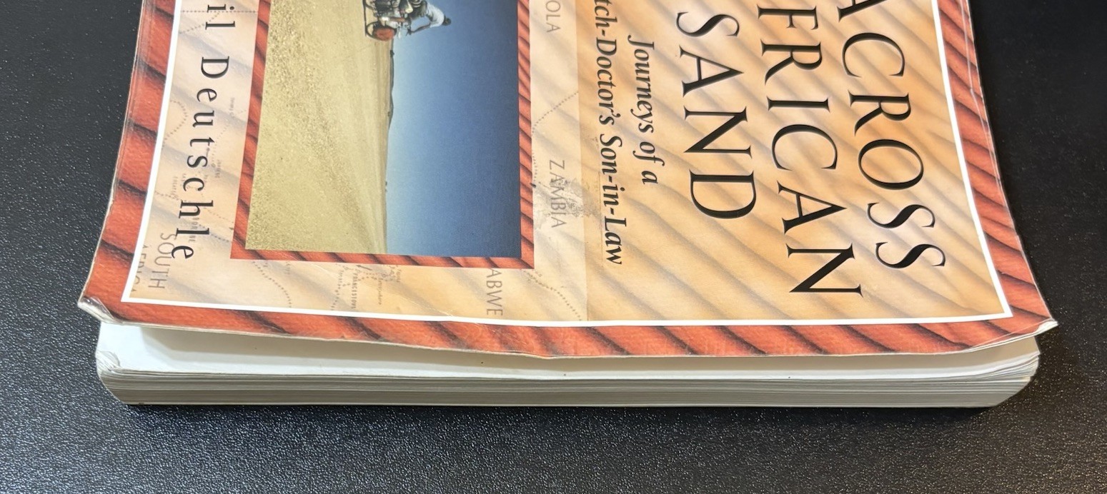 Vintage 2000 Across African Sand by Phil Deutschle (1st Ed PB Ex‑Library)