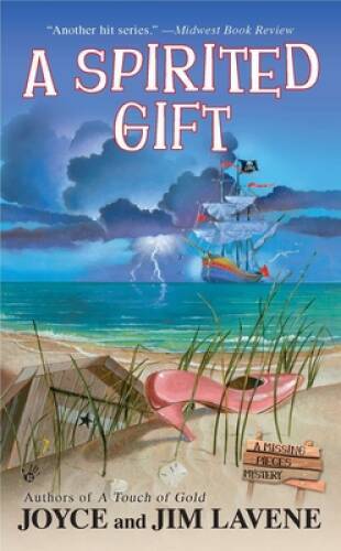 A Spirited Gift (A Missing Pieces Mystery) – Mass Market Paperback – GOOD