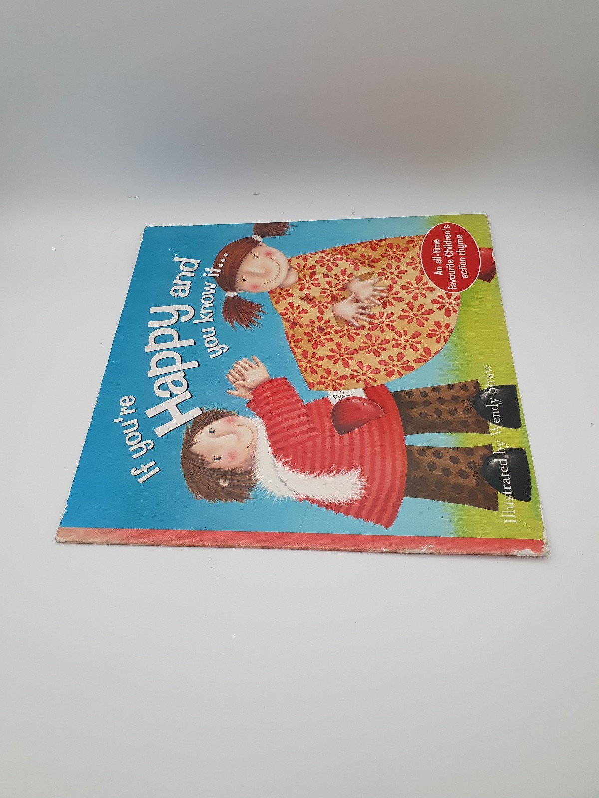 IF YOU&rsquo;RE HAPPY AND YOU KNOW IT KIDS BOOK ILLUSTRATED BY WENDY STRAW 2009