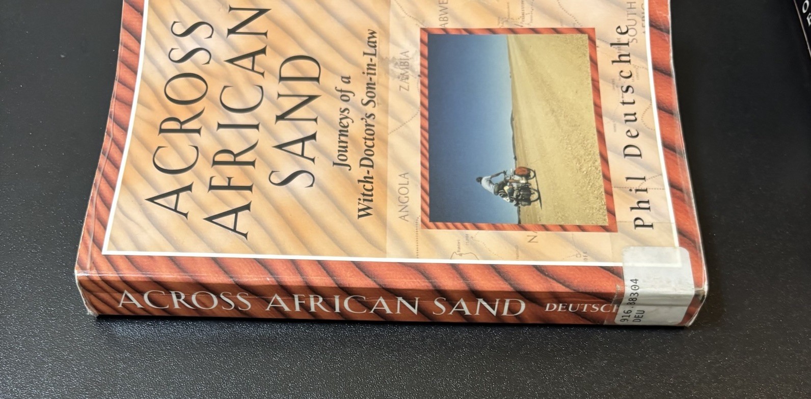 Vintage 2000 Across African Sand by Phil Deutschle (1st Ed PB Ex‑Library)