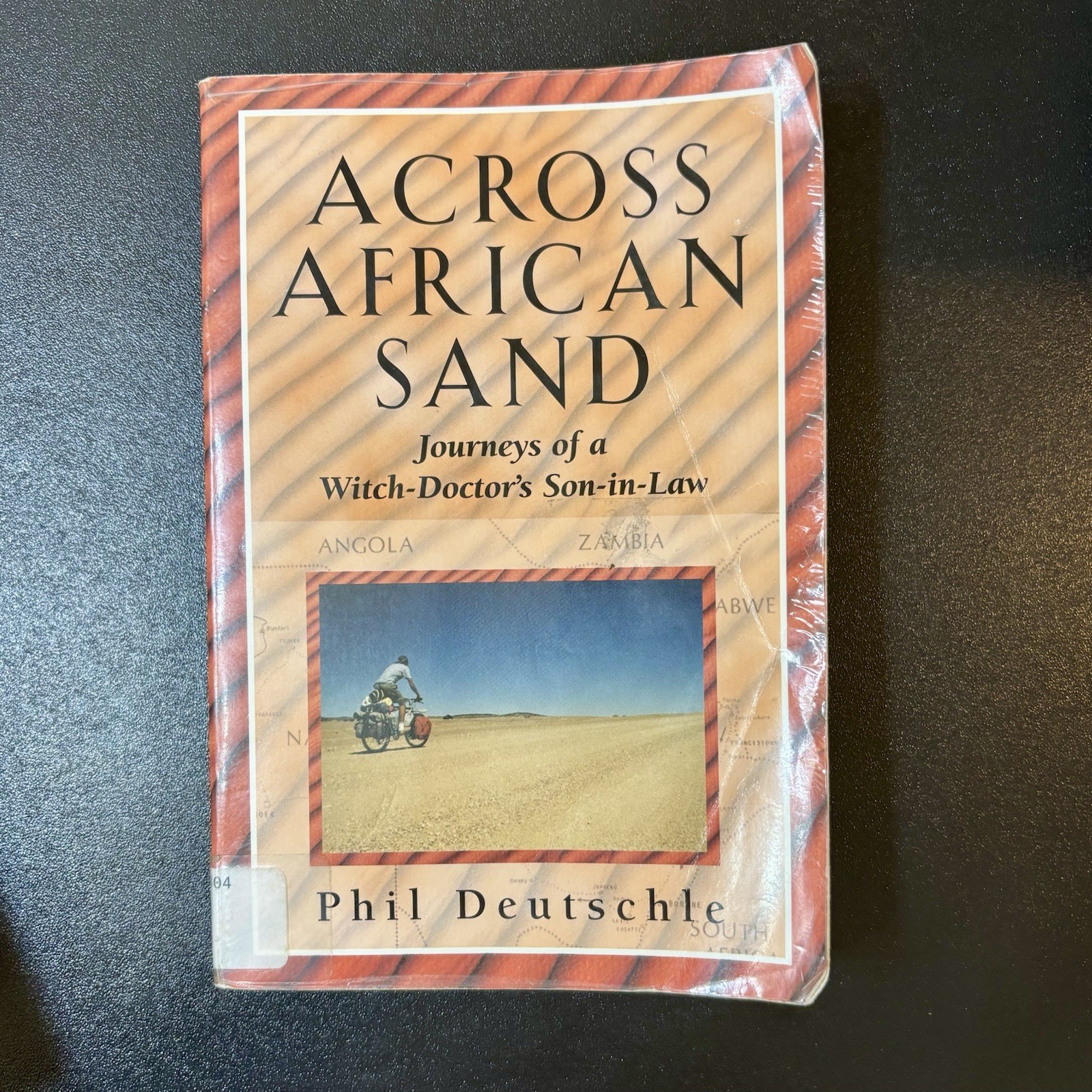 Vintage 2000 Across African Sand by Phil Deutschle (1st Ed PB Ex‑Library)